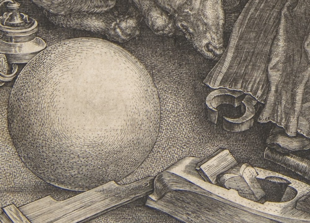 Hatching: the sphere and the floor at the foot of Dürer's Melencolia I, 1514, the sphere's tone built from strokes that follow its curve, the floor from two sets crossing.
